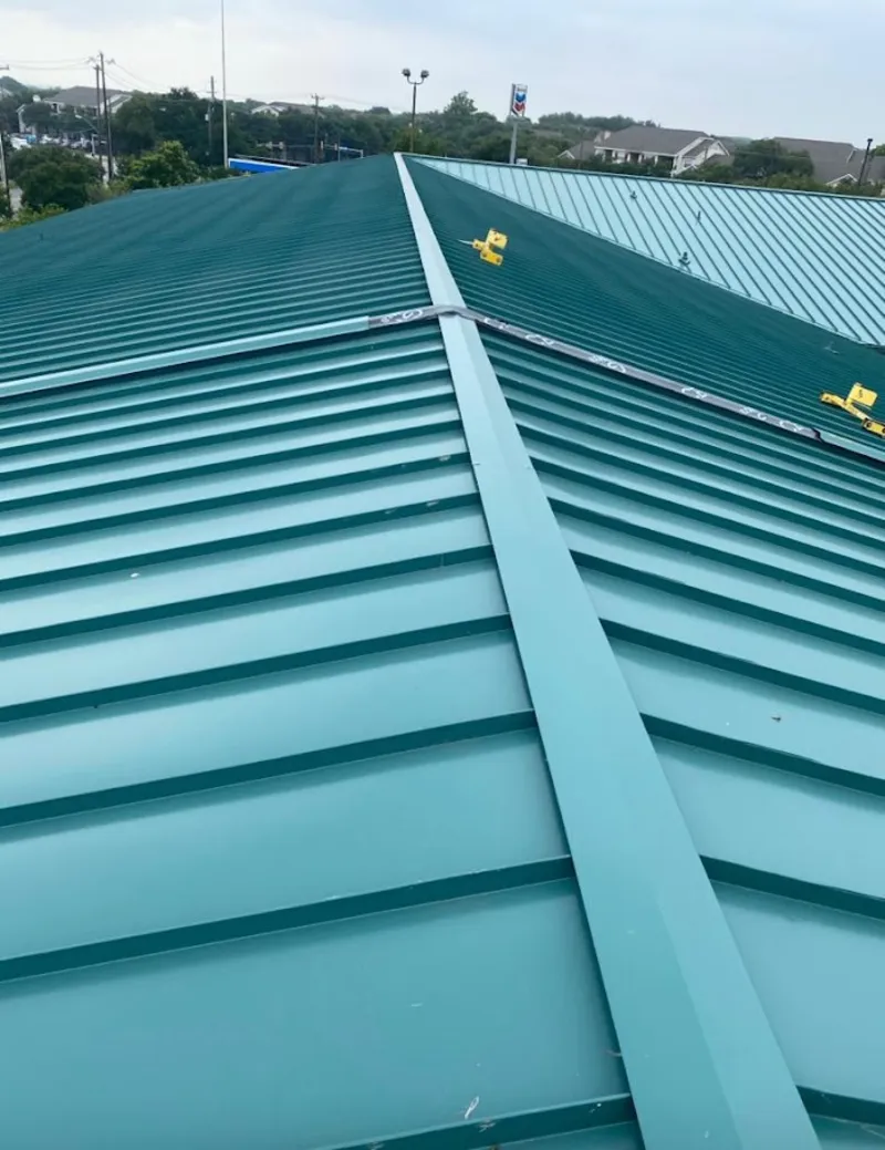 Green commercial metal roof ridge and valley for Metal Roof Repair in Tomball